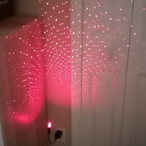 Red rain shower plug in light. With adapter